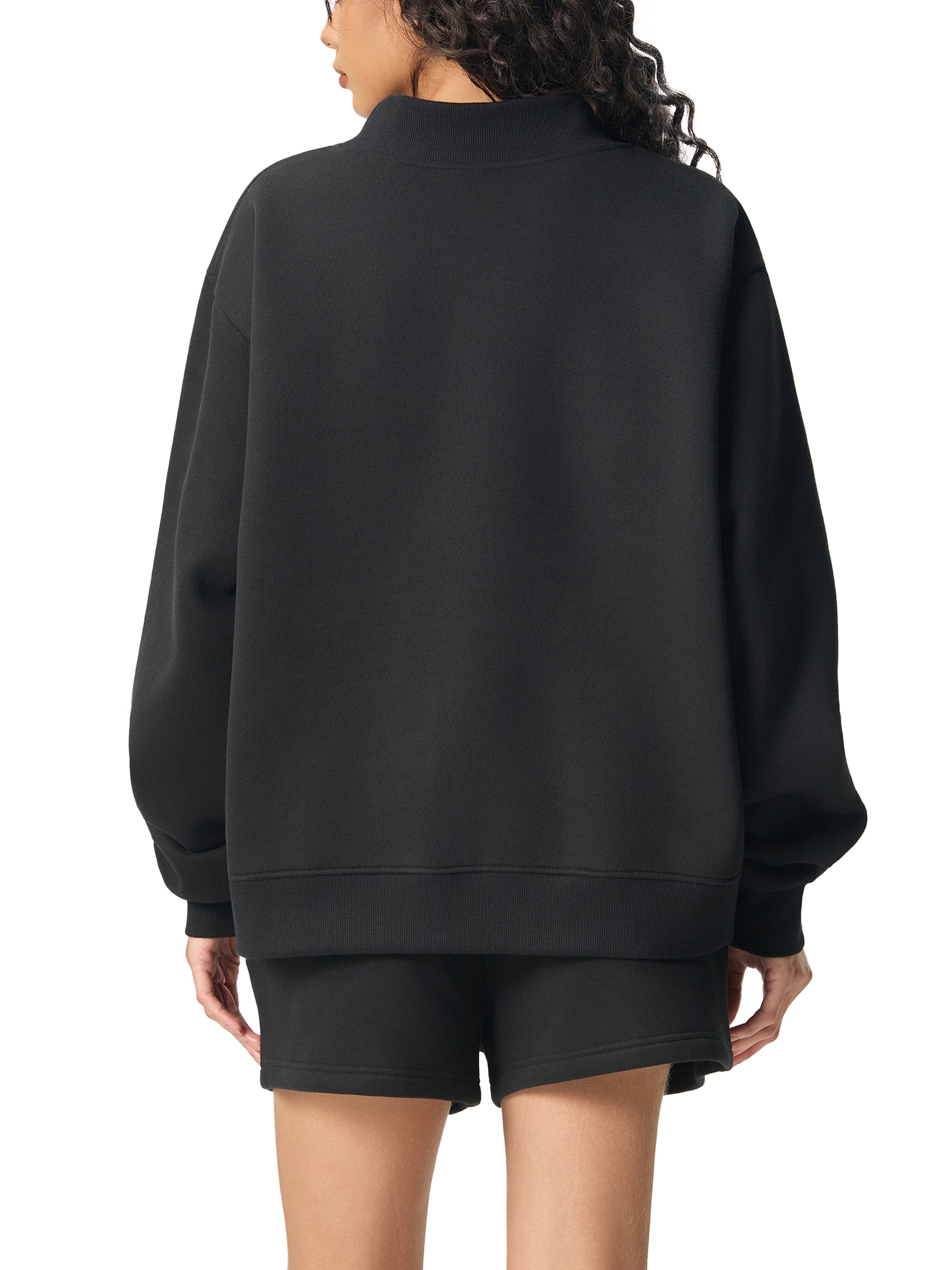 Model wearing Women's 350 GSM Heavyweight Oversized Mock-Neck Sweatshirt in Black - R/NDM.NS DEFAULT Design - Back